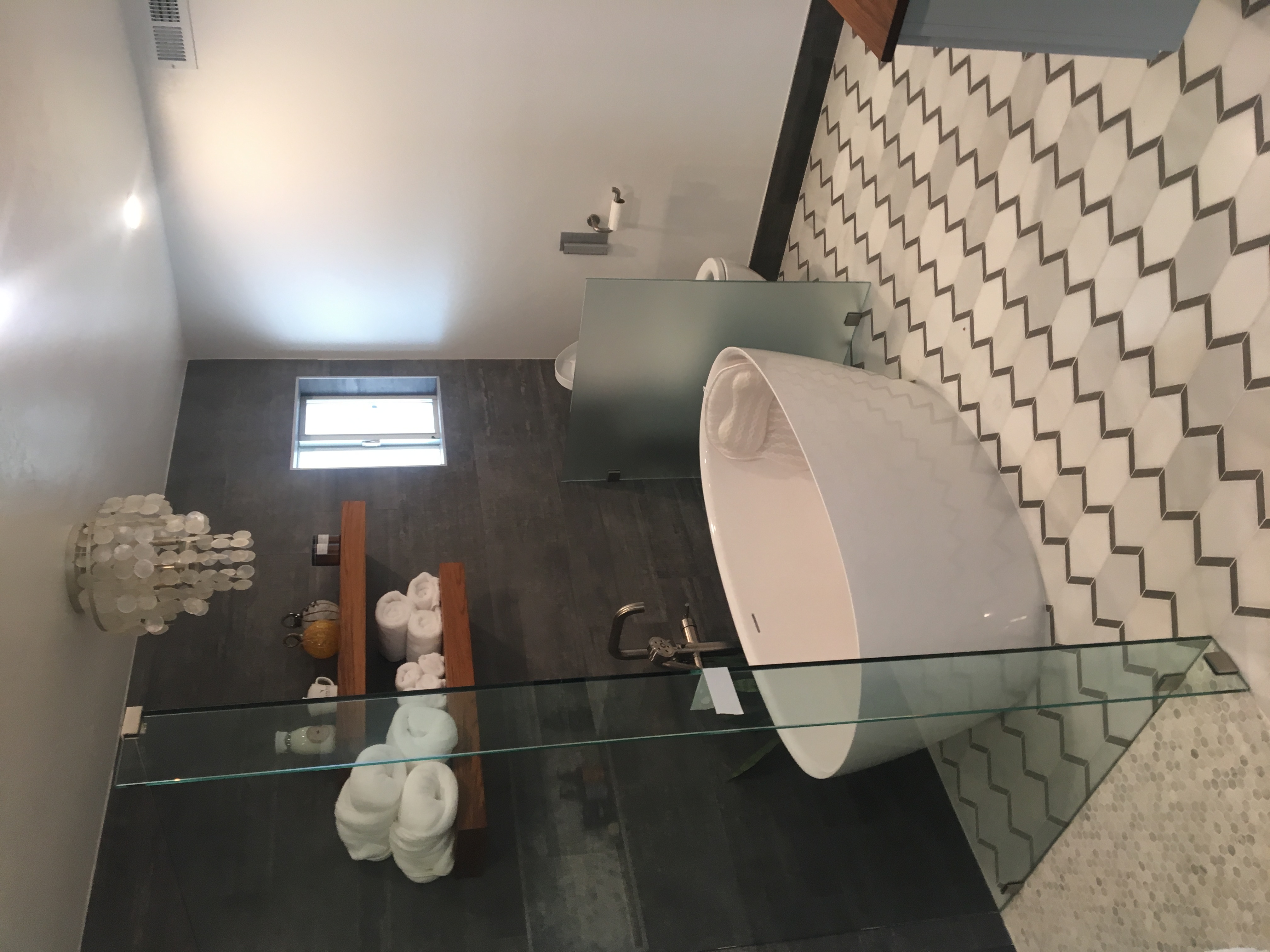 heavy plate glass shower door in green valley and glass wall